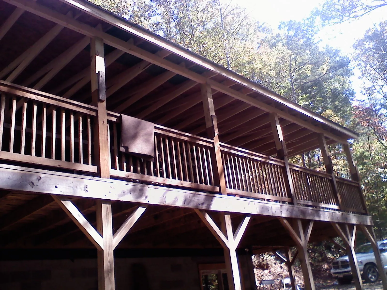 Timber framing under a new elevated porch and deck — Roof Leak Repair in Minnesota City by Roofing Brothers